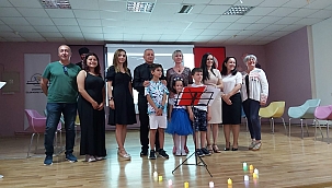 ÖZLEM KAYALI İLKOKULU'NDA  "KELİMELERİN SEVGİYLE DANSI" TEMALI ŞİİR DİNLETİSİ